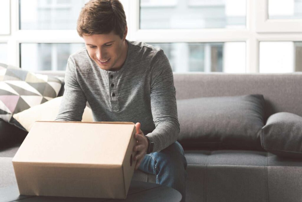 Man Unboxing a Package