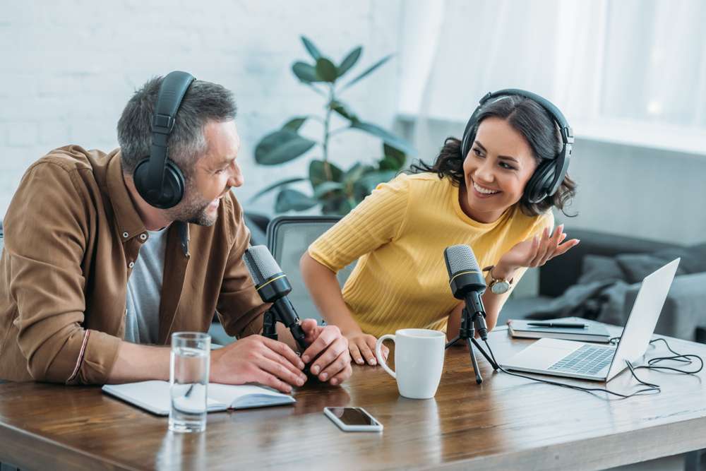 Man and Woman discussing on a podcast