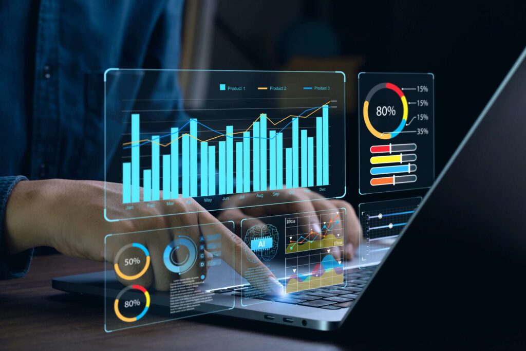 holographic charts over a laptop